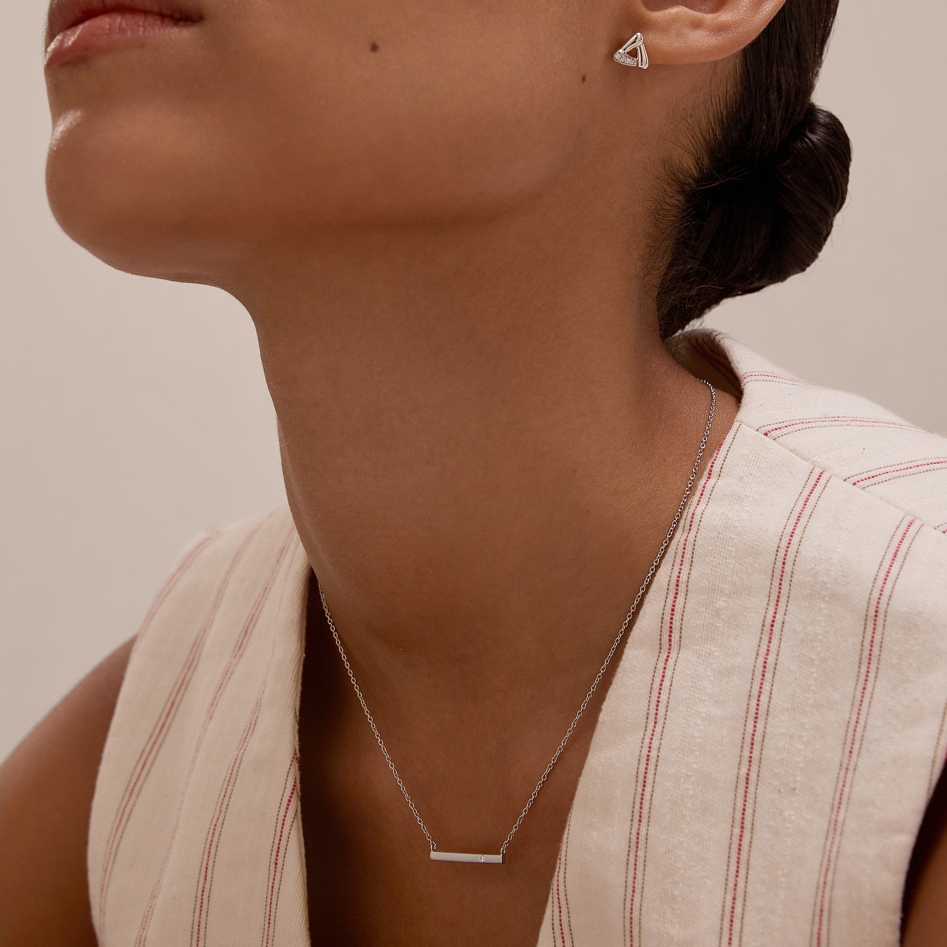 Vanchi Silver Bar Necklace on model with studs